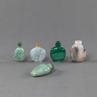 <b>FIVE SNUFF BOTTLES: TWO JADE, ONE MALACHITE, ONE TURQUOISE, ONE AGATE</b>