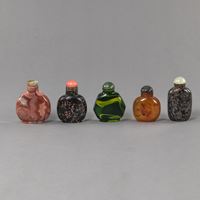 <b>FIVE SNUFFBOTTLES MADE OF STONE, AGATE AND GLASS</b>