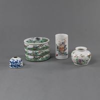 <b>FOUR POLYCHROME PAINTED PORCELAINS: A THREE-PART STACKING BOX, A SMALL BRUSH POT AND TWO VASES</b>