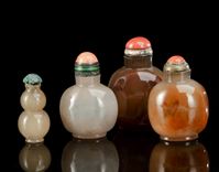 <b>THREE PLAIN NEAR-GLOBULAR SNUFF BOTTLES AND A GOURD SHAPE SNUFF BOTTLE, WITH CORAL AND TURQUOISE STOPPERS</b>