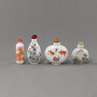 <b>FOUR PORCELAIN SNUFF BOTTLES WITH POLYCHROME PAINTING OF GOLDFISH, LIONS, BUTTERFLIES</b>