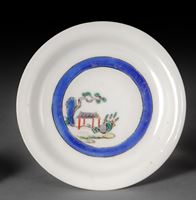 <b>A FLAT CIRCULAR SMALL PORCELAIN DISH WITH PAVILLON AND PINE IN BRIGHT ENAMELS</b>