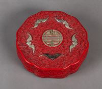<b>A JADE-INLAID FLORIFORM CINNABAR-LACQUER BOX AND COVER</b>