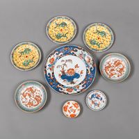 <b>A GROUP OF EIGHT POLYCHROME DRAGON AND FLOWER PORCELAIN DISHES</b>