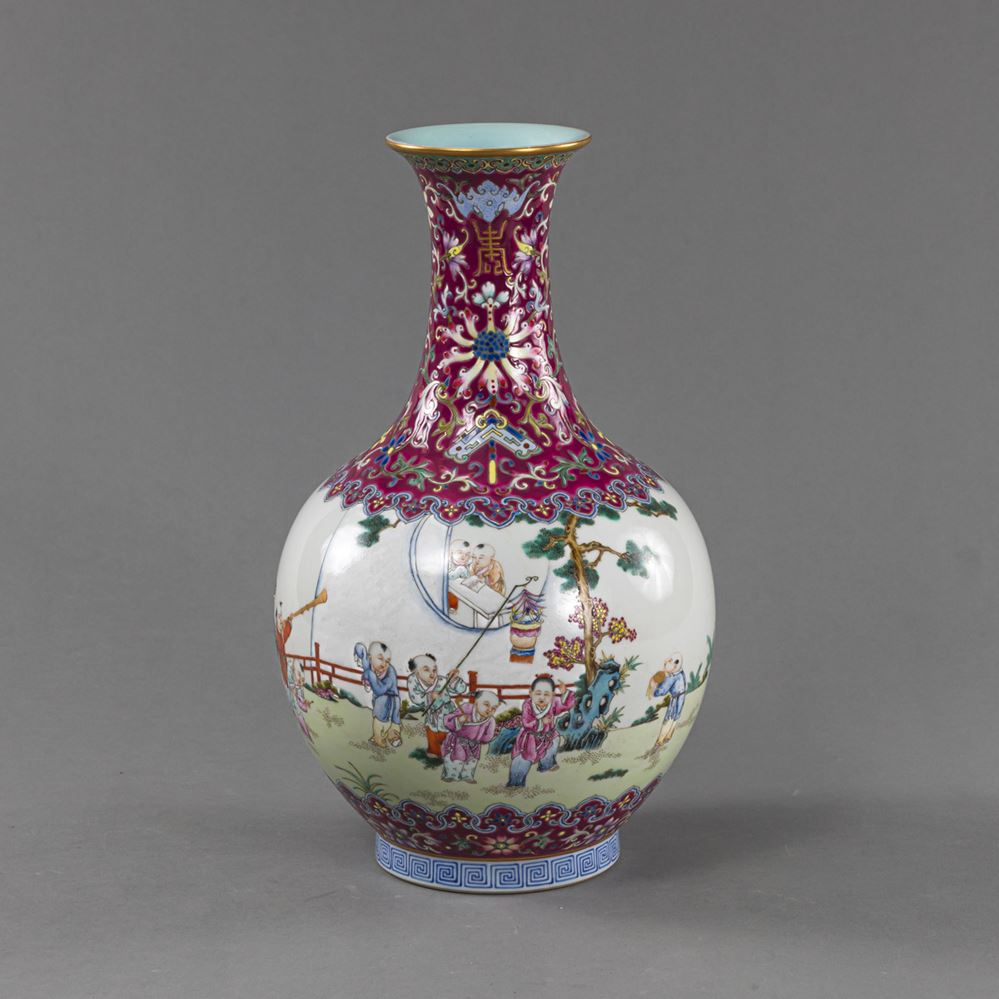 <b>A BULBOUS 'FAMILLE ROSE' VASE WITH DEPICTION OF PLAYING BOYS IN A GARDEN LANDSCAPE</b>
