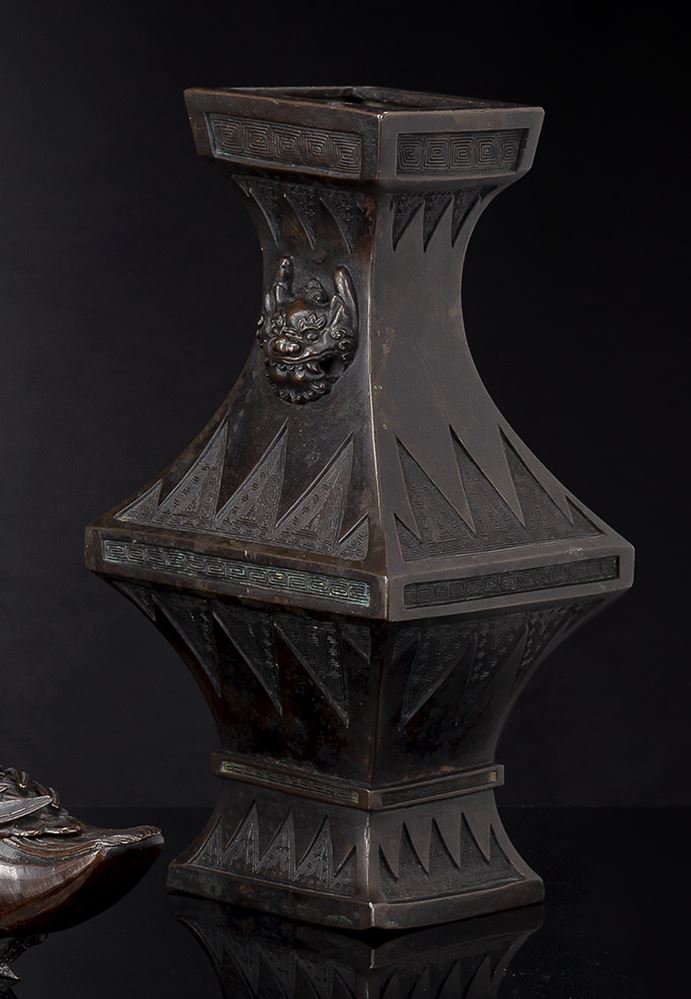 <b>A SQUARE BRONZE VASE IN ARCHAIC STYLE WITH MASK HANDLES</b>