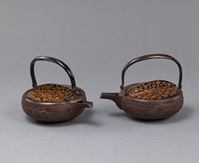 <b>TWO IRON EWERS WITH LACQUER COVERS</b>