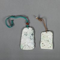 <b>TWO JADE DRAGON PENDANTS</b>
