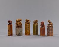 <b>SIX SOAPSTONE SEALS IN AN INLAID WOOD BOX</b>