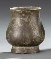 <b>A BRONZE VASE WITH SILVER-INLAYS IN ARCHAIC STYLE</b>