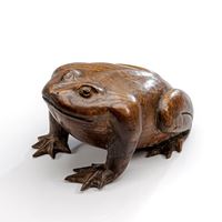 <b>A CARVED WOOD OKIMONO OF A SEATED TOAD</b>