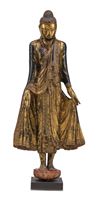 <b>A WOOD STANDING BUDDHA WITH GOLD LACQUER AND COLOR PAINTING ON A LOTUS</b>