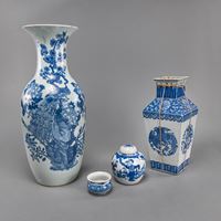 <b>A BLUE AND WHITE PEACOCK PORCELAIN VASE, A SQUARE DRAGON VASE, A SMALL VASE WITH COVER, AND A SPITTOON</b>