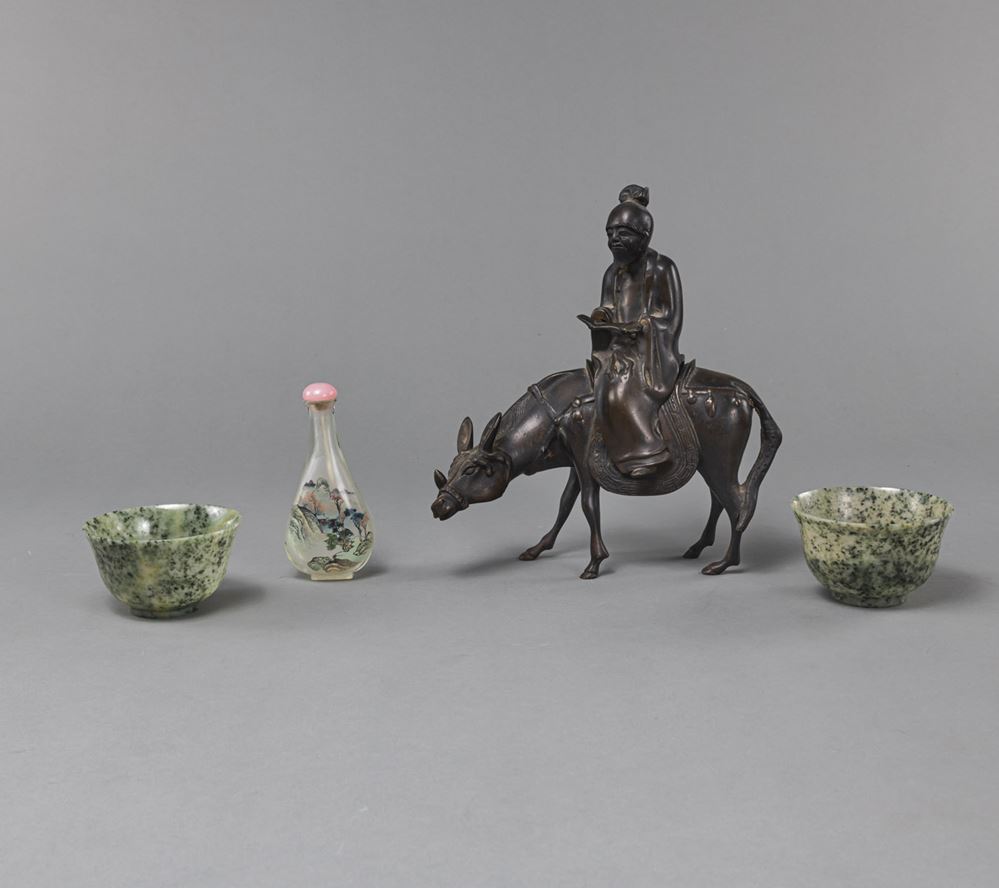 <b>A BRONZE FIGURE OF A SCHOLAR ON A DONKEY, A PAIR OF GREEN BOWLS, AND A GLASS SNUFFBOTTLE</b>