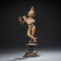 <b>A BRONZE FIGURE OF KRISHNA</b>