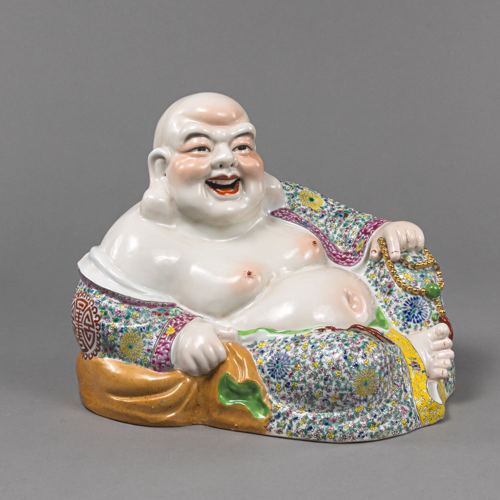 <b>A POLYCHROME PORCELAIN FIGURE OF BUDAI</b>