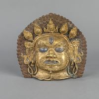 <b>A GILT-BRONZE MASK OF BHAIRAVA</b>