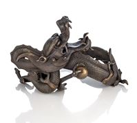 <b>A BRONZE OKIMONO OF A CURLED DRAGON</b>