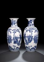 <b>A PAIR OF BLUE AND WHITE FIGURAL PORCELAIN BALUSTER VASES</b>