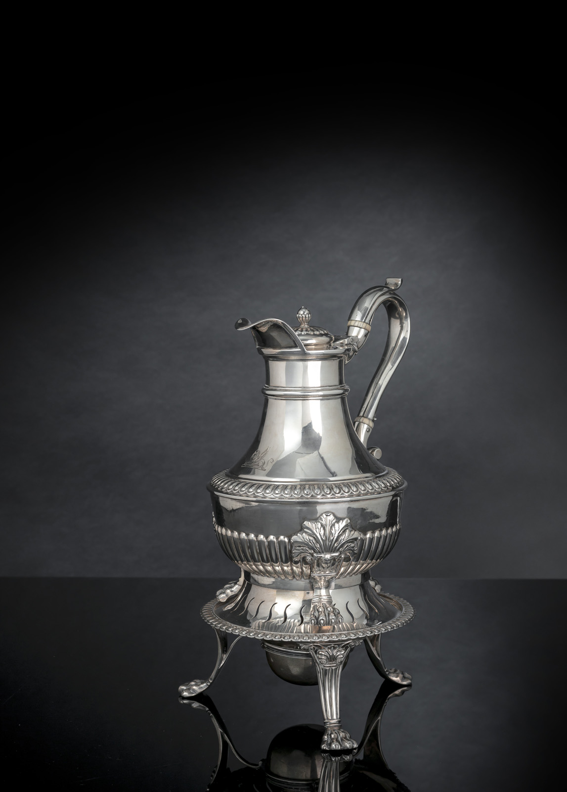 <b>AN ENGLISH GADROON AND ACANTUS TOOLED COFFEE POT AND WARMER</b>