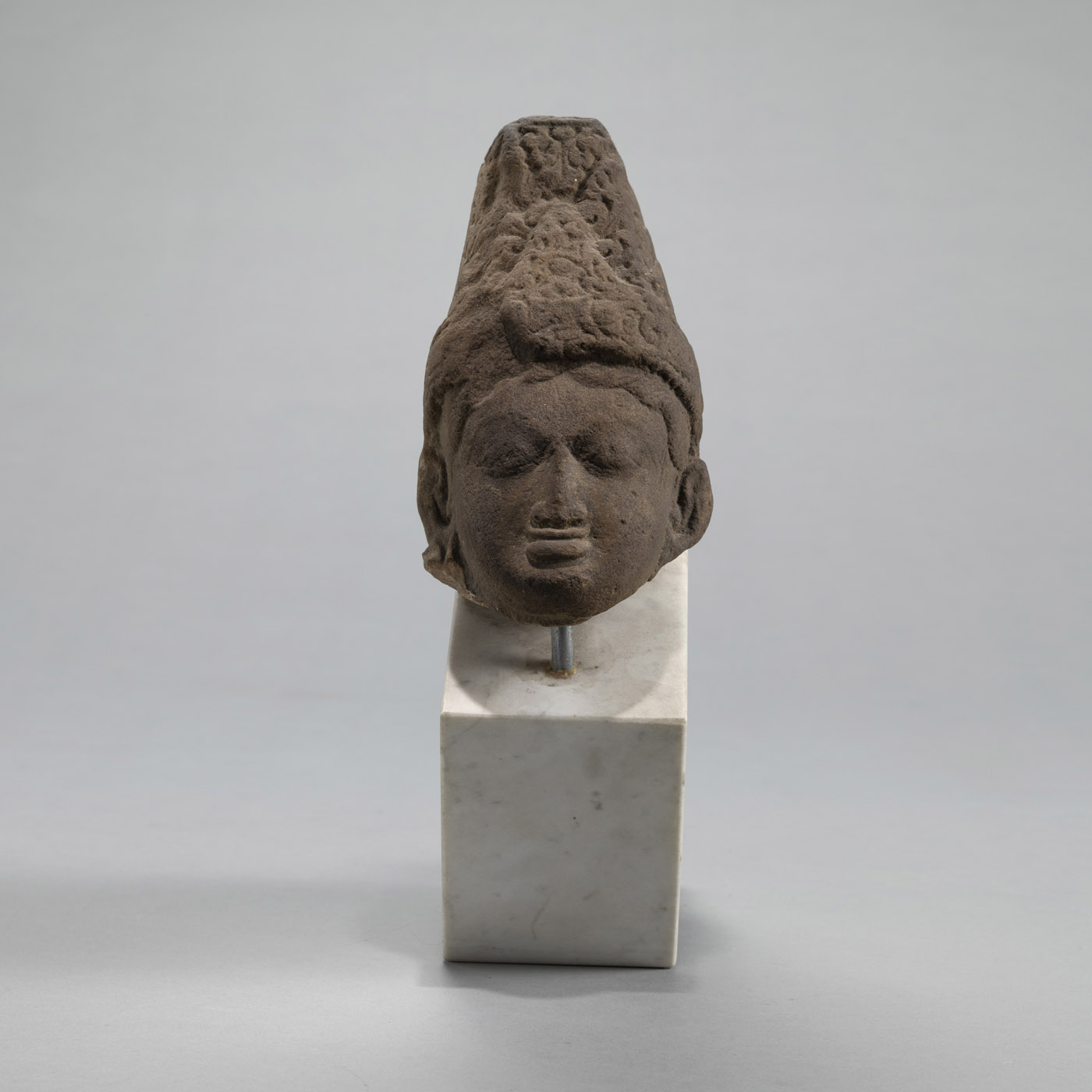 <b>A SANDSTONE HEAD OF VISHNU</b>