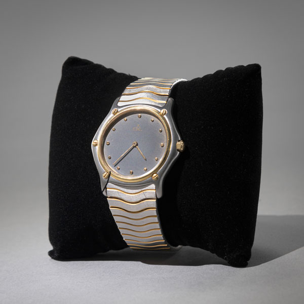 <b>A PARTIAL GILT STAINLESS STEEL WRIST WATCH</b>