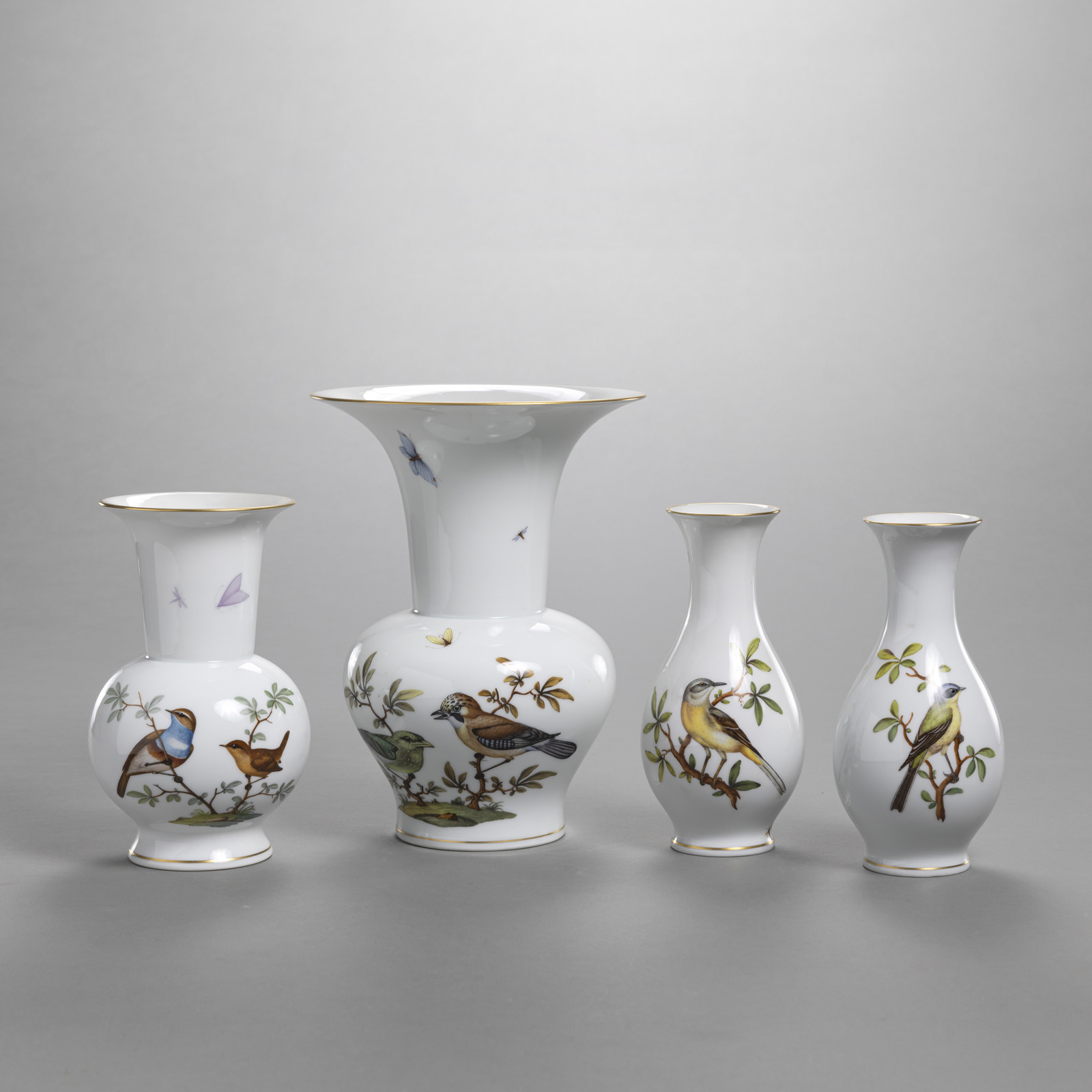 <b>FOUR BALUSTRE SHAPED ORNITOLOGICAL PATTERN VASES</b>