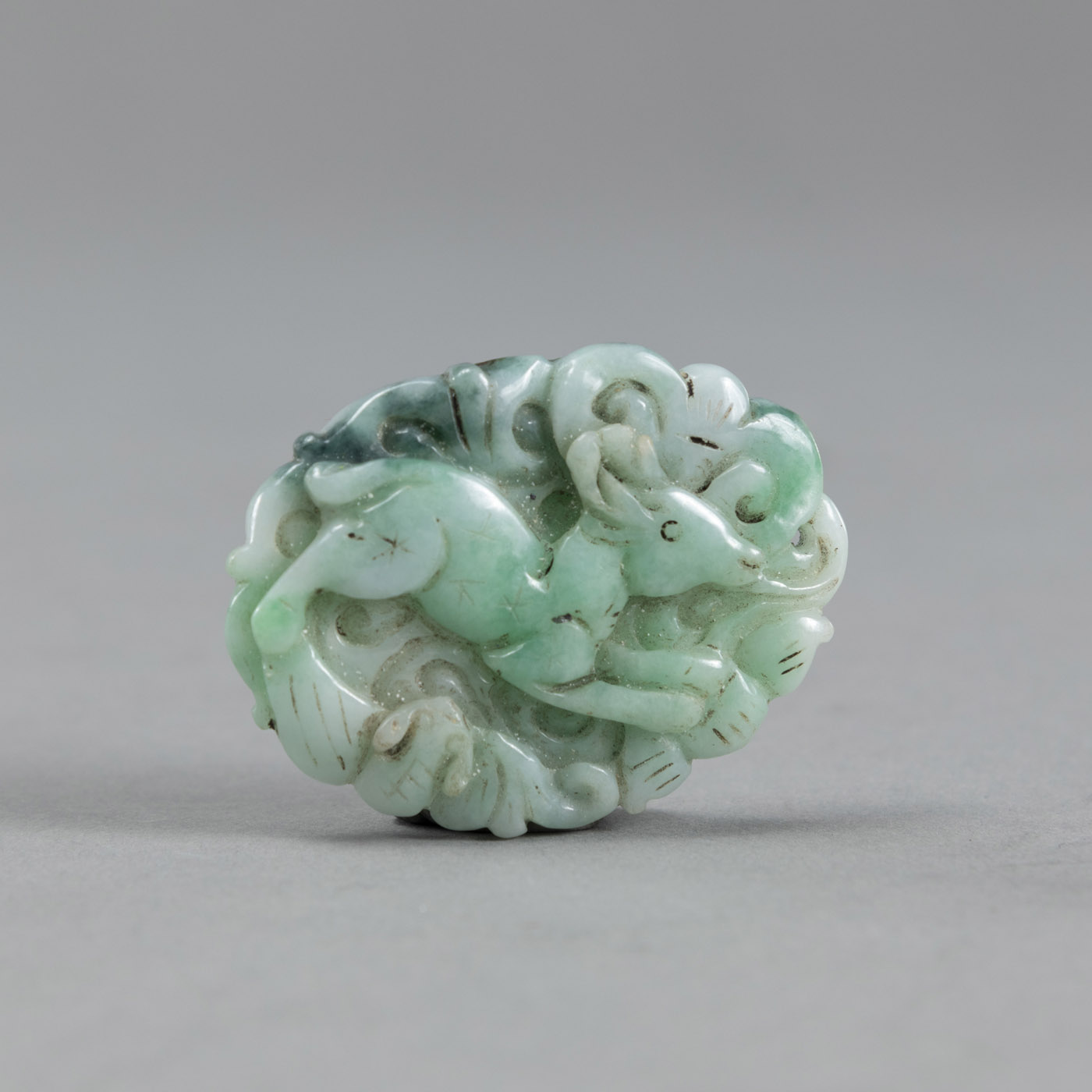 <b>A JADEITE PENDANT DEPICTING 'BAT AND DEER'</b>