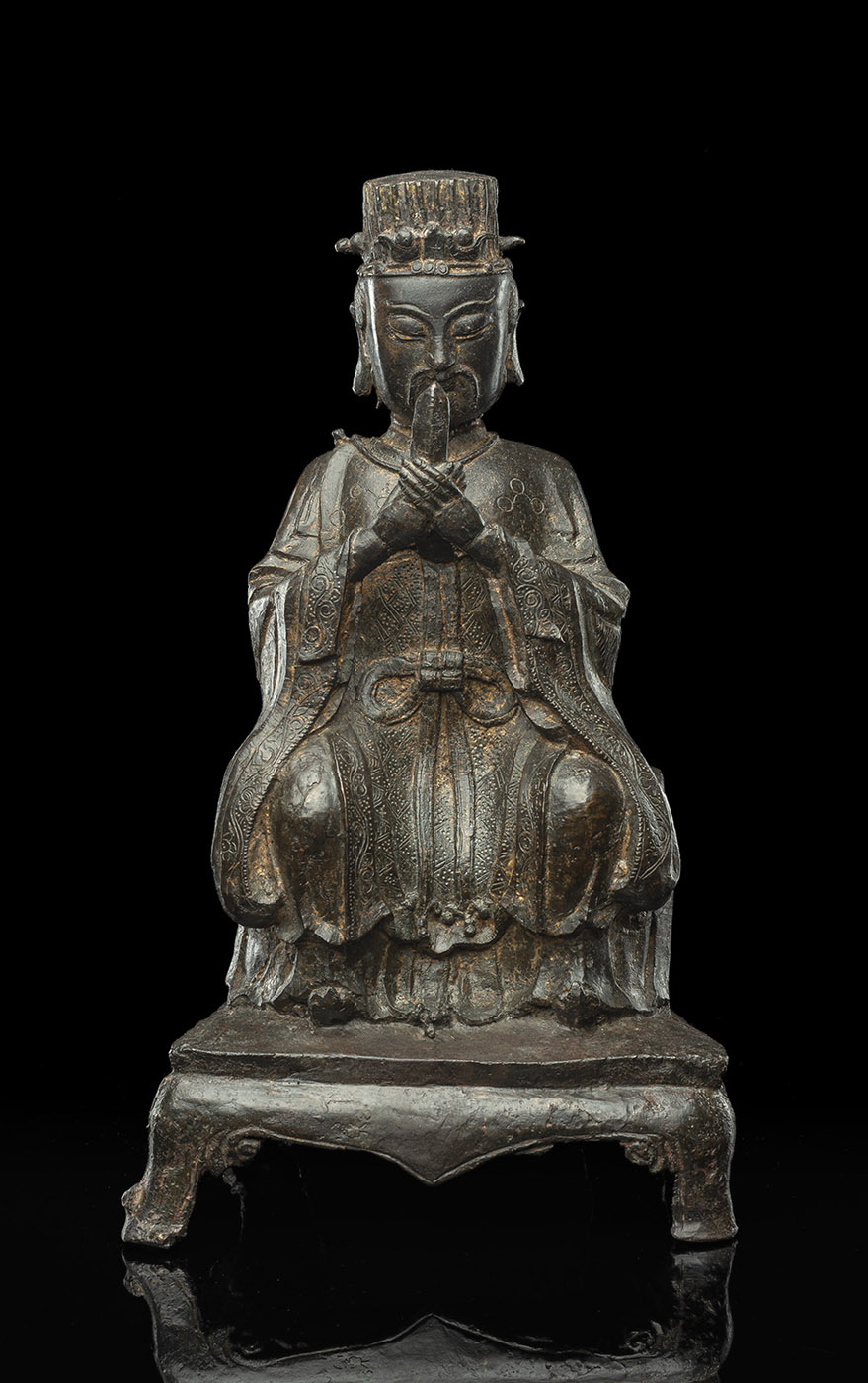 <b>A BRONZE FIGURE OF A DAOIST IMMORTAL</b>