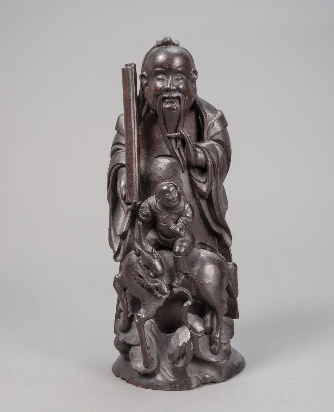 <b>Holzfigur des 'Lu' mit auf einem Qilin reitenden Knaben</b>