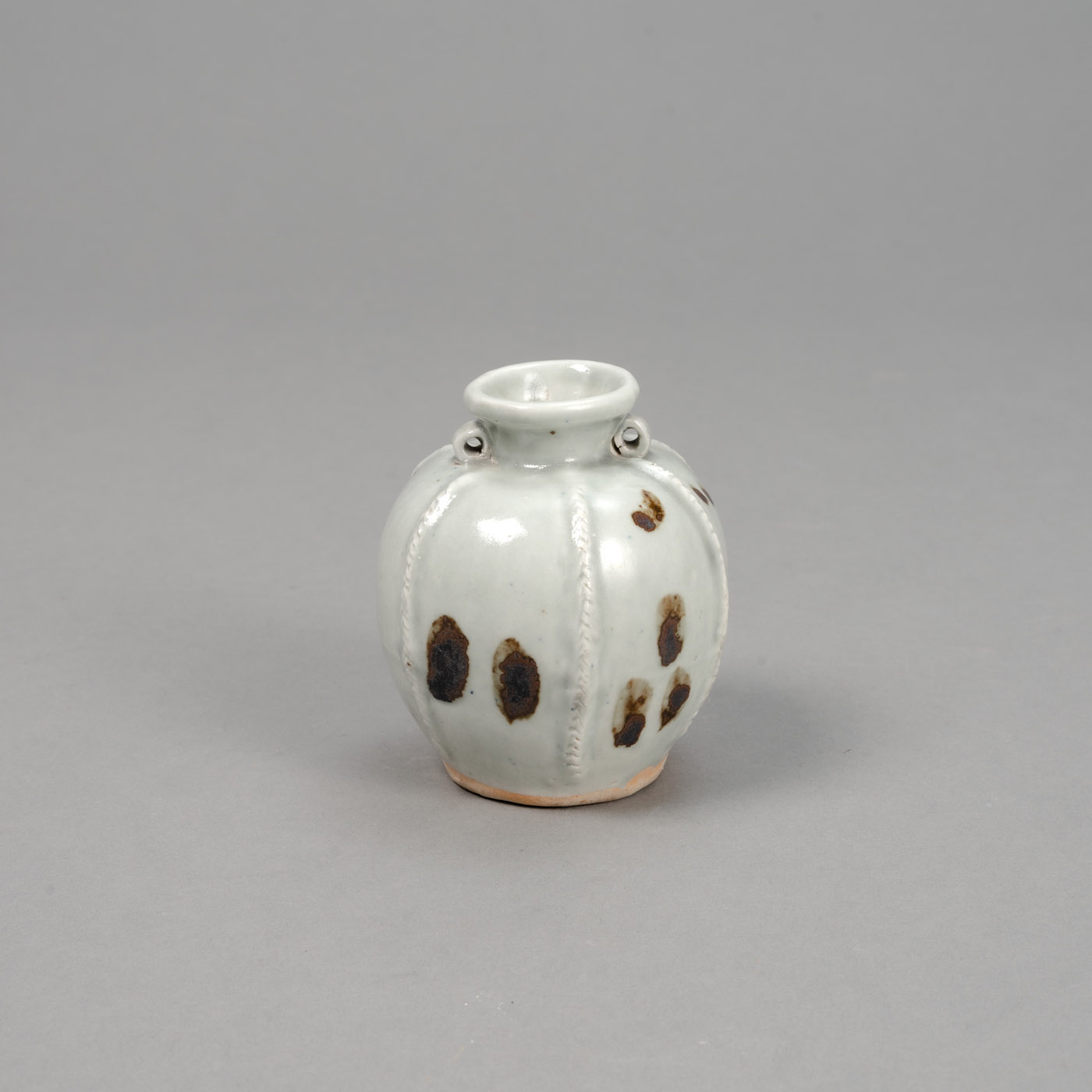 <b>A SMALL 'QINGBAI' IRON-SPOTTED VASE</b>