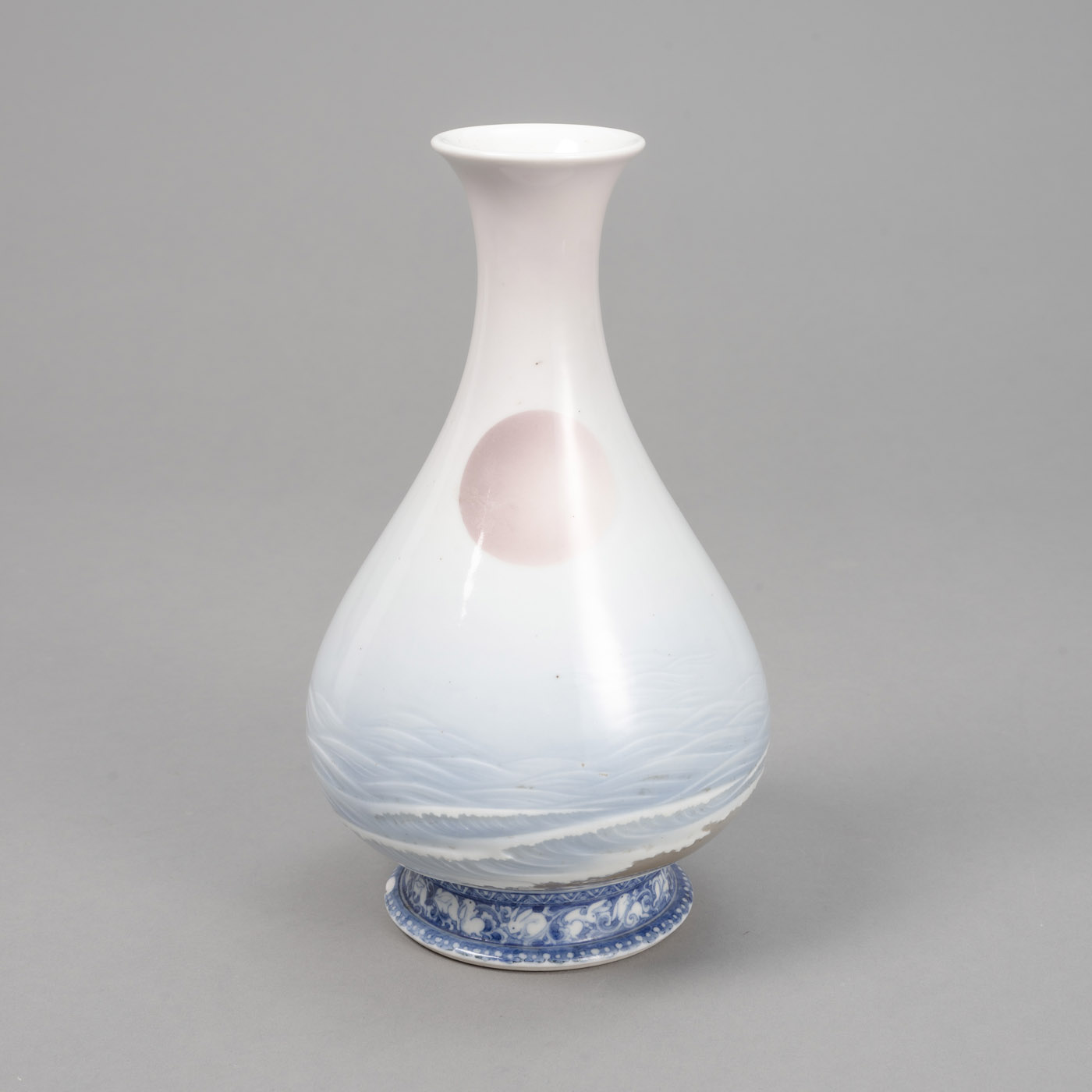 <b>AN UNUSUAL UNDERGLAZE-BLUE RELIEF PORCELAIN BOTTLE VASE BY SHOFU KATEI (1870-1928)</b>