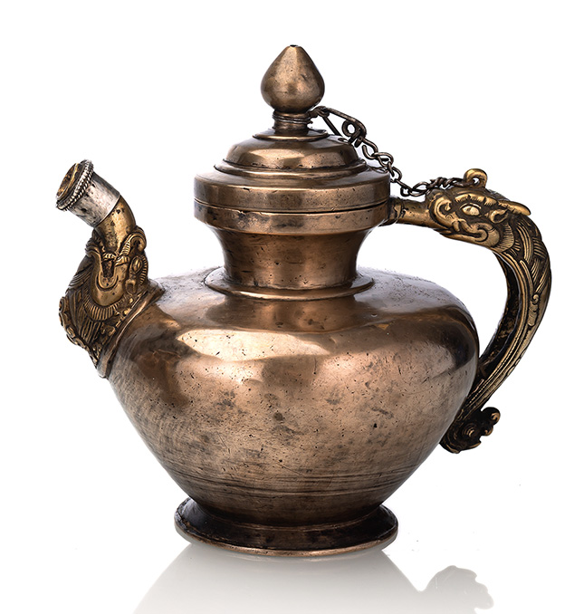 <b>A METAL AND SILVER TEAPOT</b>