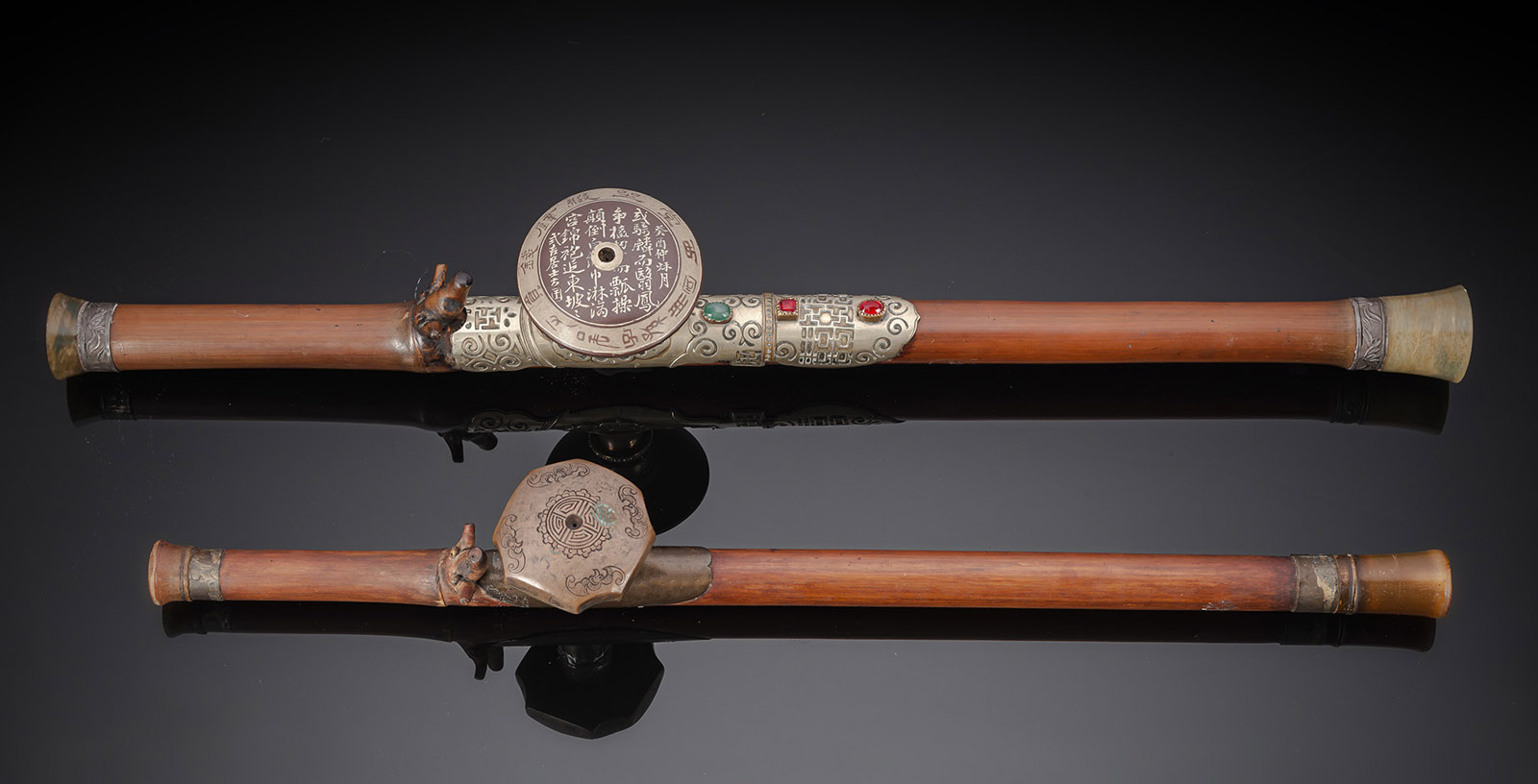 <b>TWO PARTLY GEMSTONE-INLAID OPIUM PIPES</b>