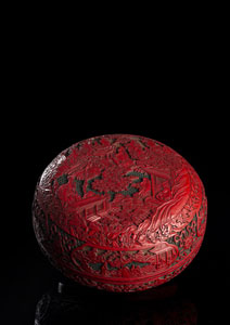 <b>A FINE AND LARGE CARVED CINNABAR LACQUER BOX AND COVER WITH GREEN AND BLACK</b>