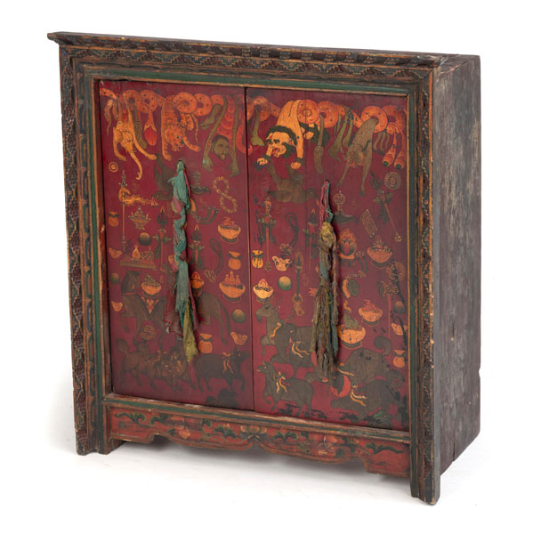 <b>A POLYCHROME WOOD CUPBOARD WITH A PAIR OF HINGED DOORS DECORATED WITH VARIOUS OFFERINGS</b>