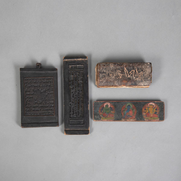 <b>TWO PRINTING BLOCKS AND THREE BOOK COVERS WITH REMAINS OF MANUSCRIPTS</b>