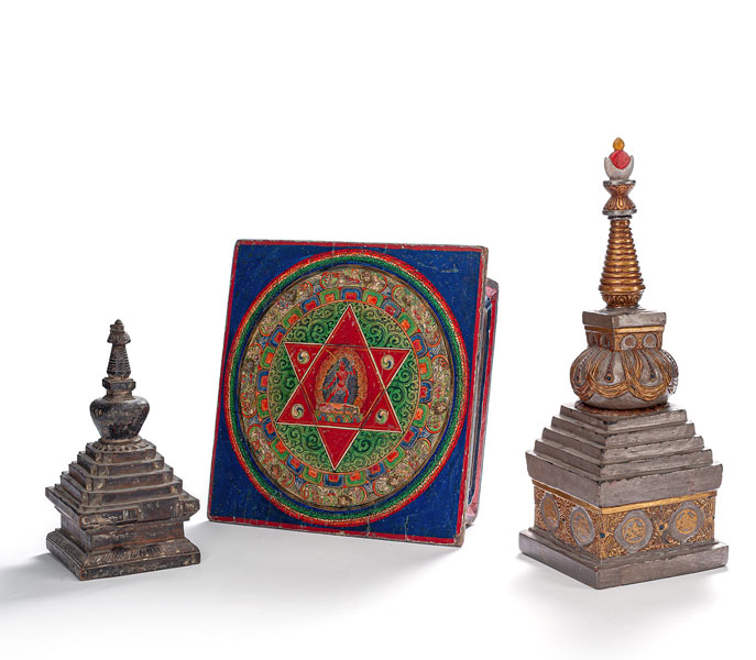 <b>A PAINTED WOODEN MANDALA ALTAR TABLE AND THREE WOOD OR BRONZE STUPA, PARTLY PAINTED</b>