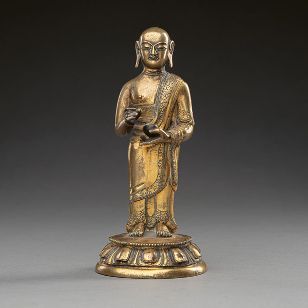 <b>A GILT-BRONZE FIGURE OF PROBABLY SARIPUTRA</b>