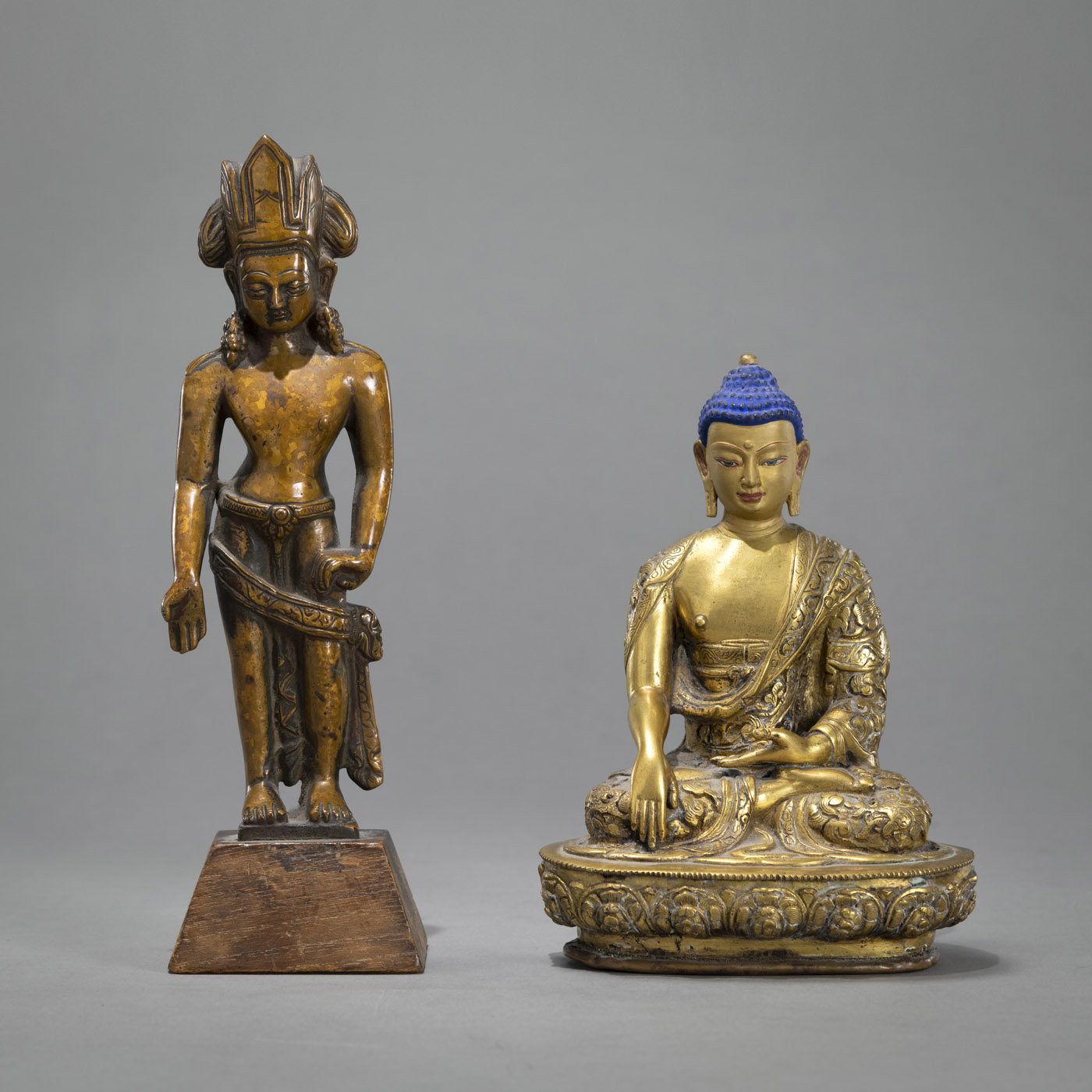 <b>A GILT-BRONZE FIGURE OF BUDDHA SHAKYAMUNI AND A BRONZE FIGURE OF PADMAPANI IN EARLY STYLE</b>