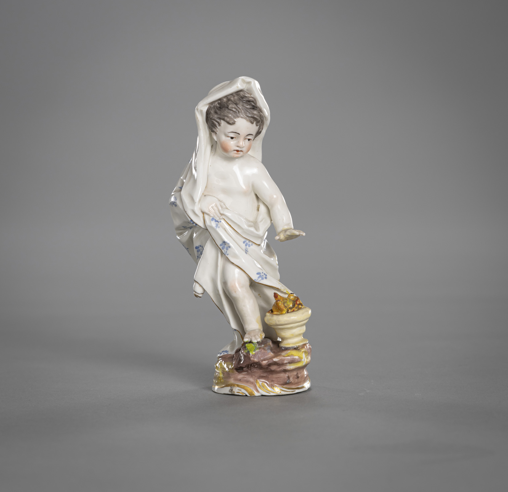 <b>A FIGURINE OF A PUTTO DEPICTING THE WINTER</b>