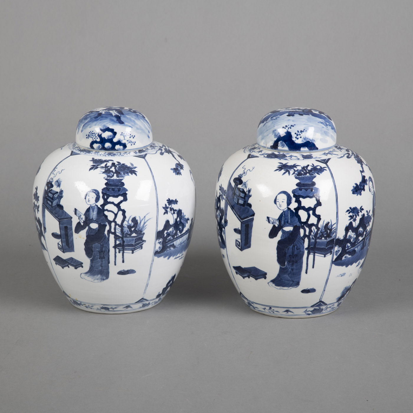 <b>A PAIR OF BLUE AND WHITE 'ELEGANT LADIES' PORCELAIN VASES AND COVERS</b>