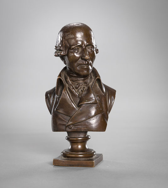 <b>A SMALL BRONZE BUST OF A ROCOCO GENTLEMAN</b>