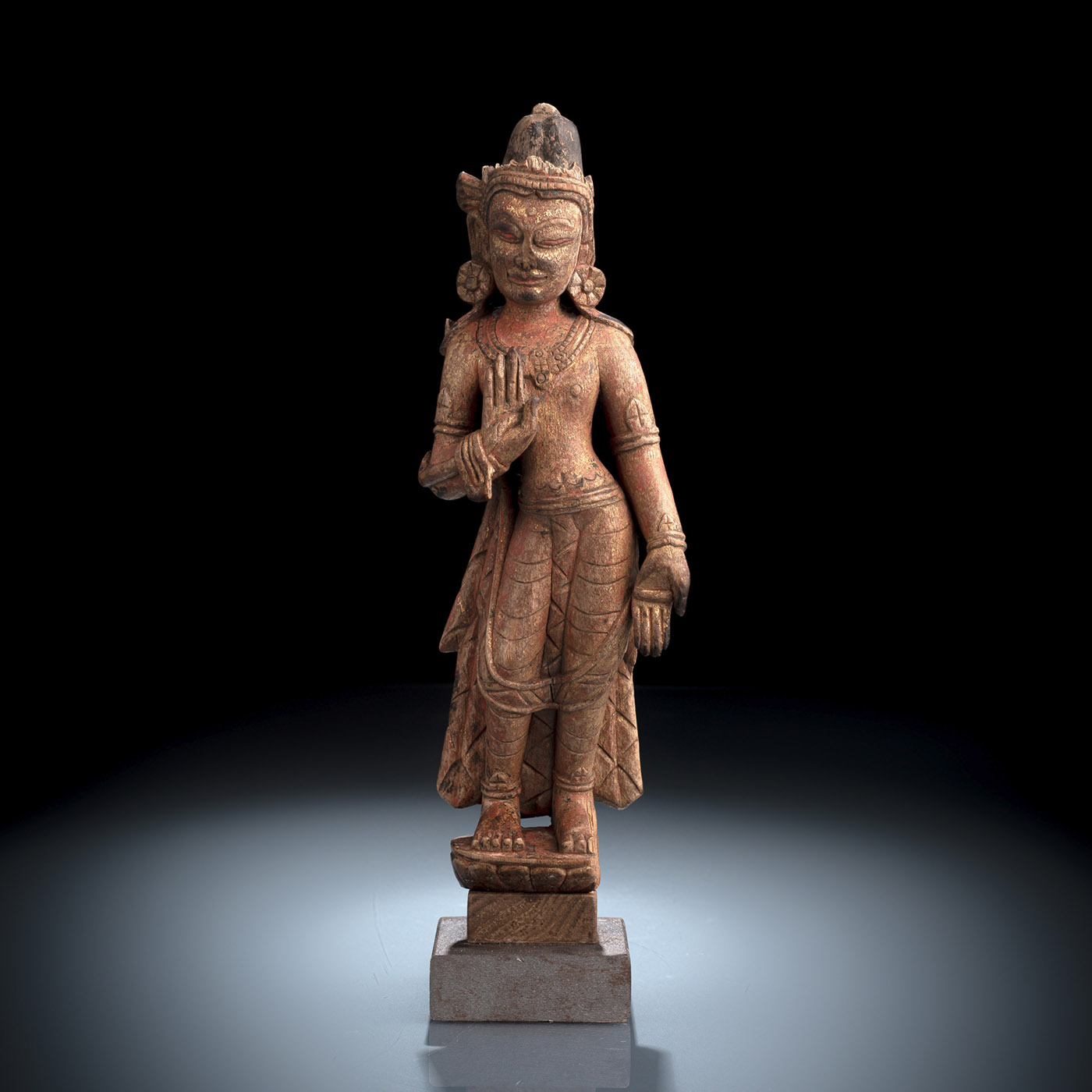 <b>A FINE AND RARE WOOD FIGURE OF STANDING PADMAPANI, Tibet, c. 13th ct.</b>