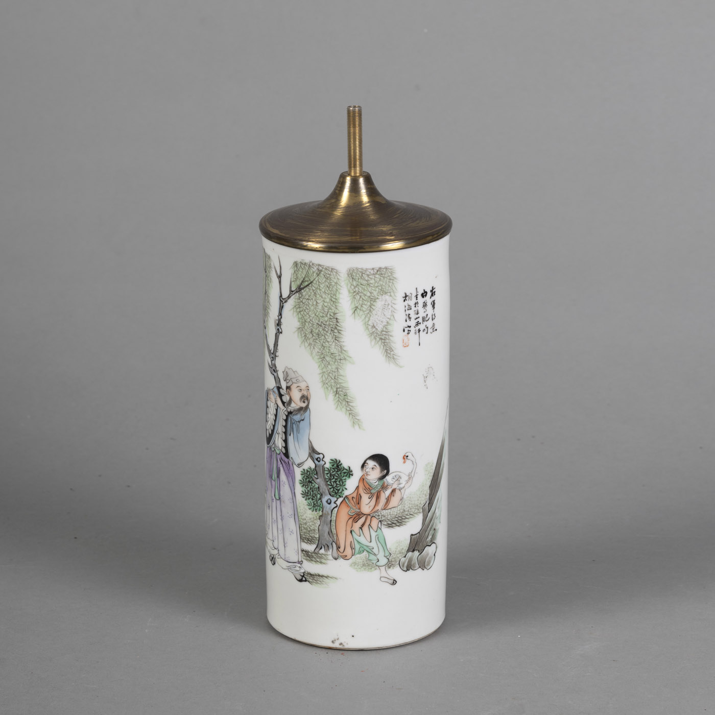 <b>A CYLINDRICAL POLYCHROME PAINTED PORCELAIN HAT STAND DEPICTING 'WANG XIZHI AND HIS GOOSE'</b>