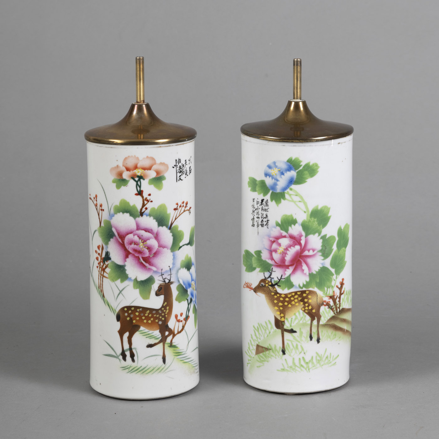 <b>A PAIR OF CYLINDRICAL POLYCHROME PAINTED HAT STANDS DEPICTING PEONIES AND DEER</b>