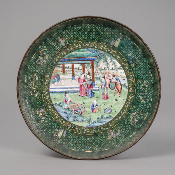 <b>A CANTON-ENAMEL 'FIGURES IN THE GARDEN' PLATE</b>