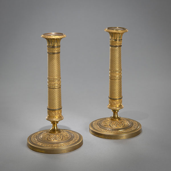 <b>A PAIR OF CHARLES X BRONZE CANDLESTICKS</b>