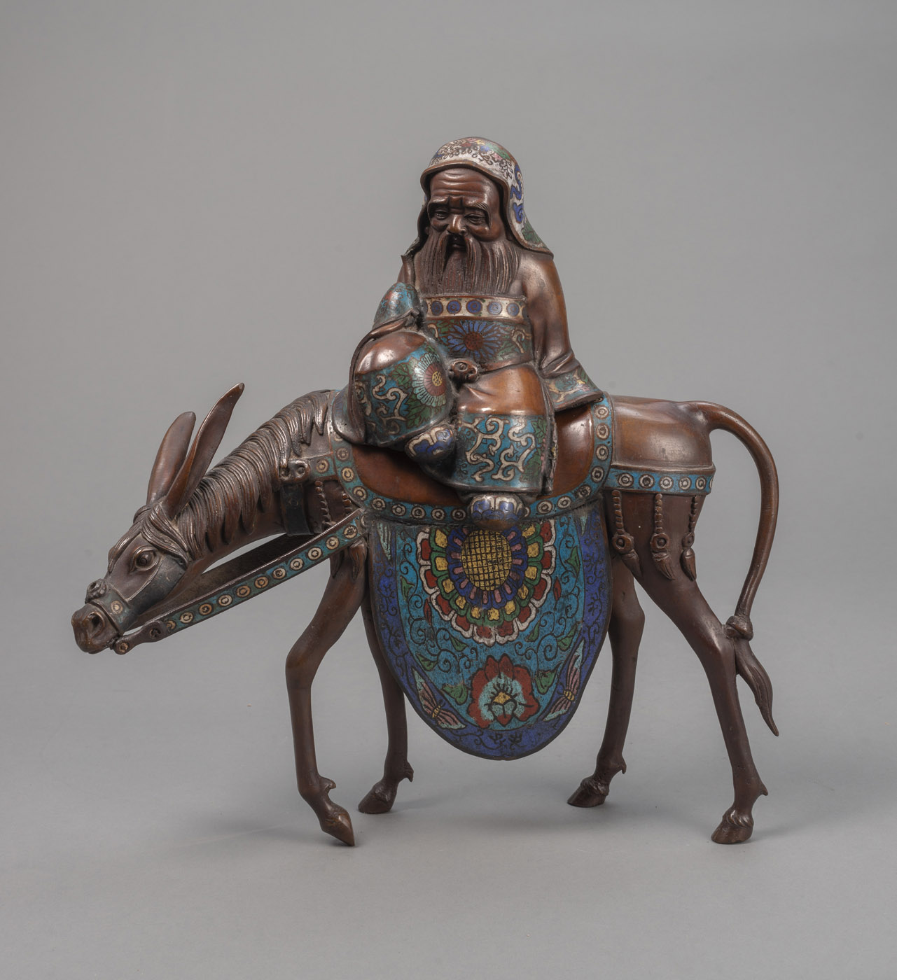 <b>Champlevé-Figur des Jurôjin auf einem Pferd sitzend</b>