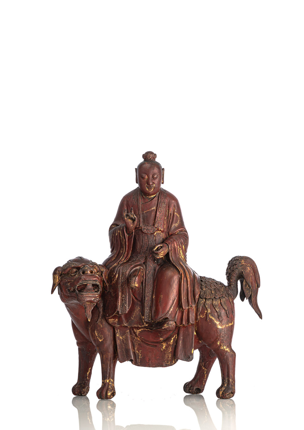 <b>A RED-LACQUERED WOOD FIGURE OF PROBABLY  TAIYI, THE HEAVENLY SAVER</b>